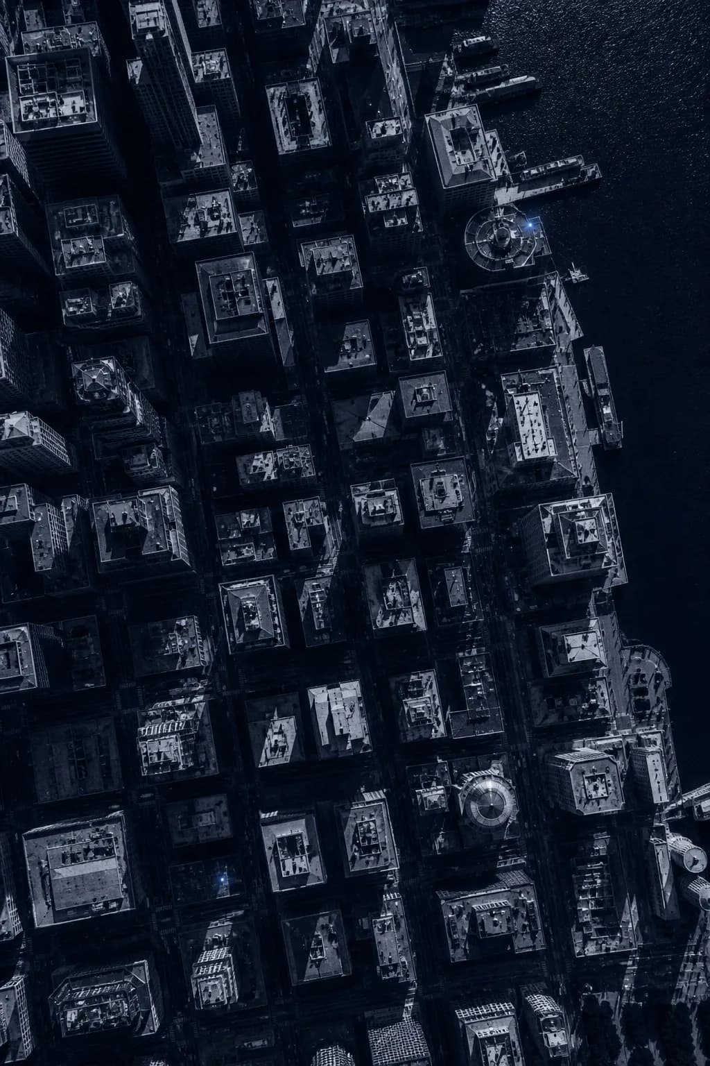 A city business district photographed from directly above at dawn.